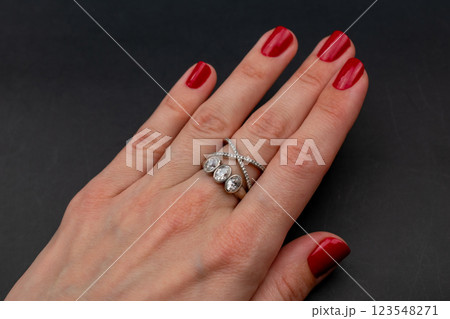 Statement ring for women on a black background, fine jewelry concept,  promotional photo for an online vintage and handmade jewelry store 123548271