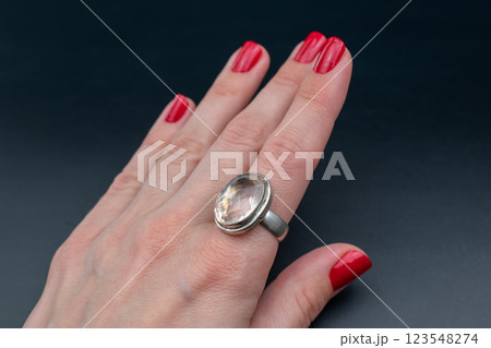 Statement ring for women on a black background, fine jewelry concept,  promotional photo for an online vintage and handmade jewelry store 123548274