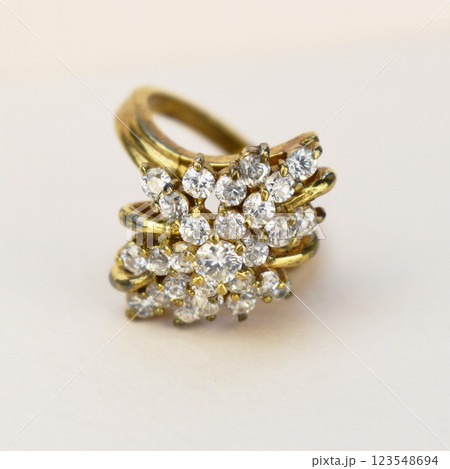 Statement ring for women on a white background, fine jewelry concept, promotional photo for an online vintage and handmade jewelry store Statement ring for women on a white background, fine jewelry concept, promotional photo for an online vintage and handmade jewelry store 123548694