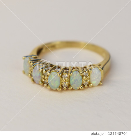 Statement ring for women on a white background, fine jewelry concept,  promotional photo for an online vintage and handmade jewelry store 123548704
