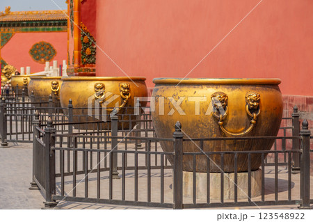 Forbidden City golden water vessels with lion head handles, Beijing, China 123548922