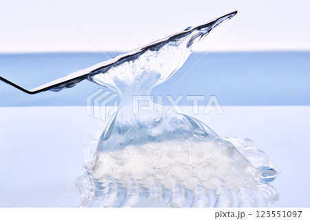 Gel toothpaste on a blue background. Gel toothpaste on a blue background. 123551097
