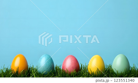 Horizontal banner with Easter eggs with space for text on top 123551340