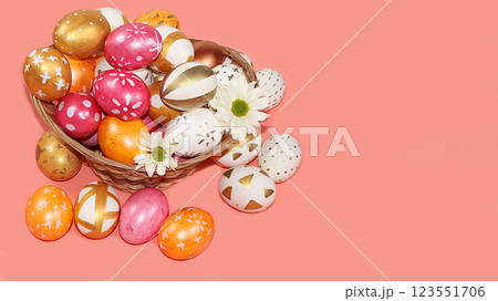 Decorated golden and pink eggs on a trendy pastel background. Minimal holiday concept. Happy Easter background, place for text, postcard, banner for the screen. 123551706
