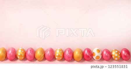 Happy Easter concept, spring card, background or banner for screen, template for design with place for text. Decorated pink Easter eggs on delicate background, selective focus 123551831
