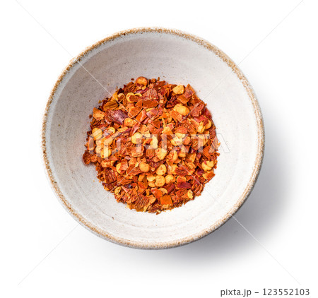 bowl of dried chili flakes 123552103