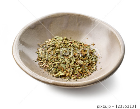 bowl of dried basil 123552131