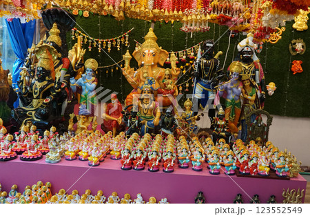 Asian hand made souvenirs made with local craftsman and being sold at the market in souvenir shop in Singapore Asian hand made souvenirs made with local craftsman and being sold at the market in souvenir shop in Singapore 123552549