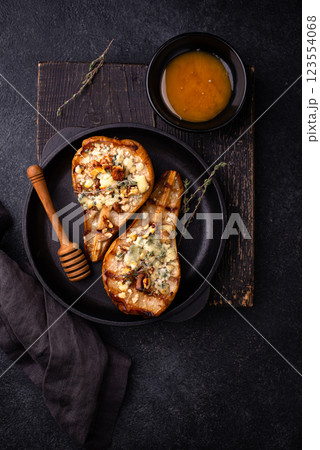 Baked pears with blue cheese and honey Baked pears with blue cheese and honey 123554068