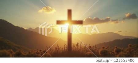 Silhouetted christian cross silhouette with glowing light - ai generated 123555400
