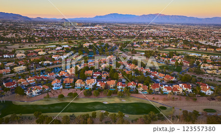 Aerial of Desert Golf Course and Suburban Homes at Sunset Aerial of Desert Golf Course and Suburban Homes at Sunset 123557380
