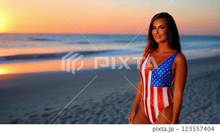 Woman Wearing USA Flag Themed Swimsuit Posing on Beach at Sunset 123557404