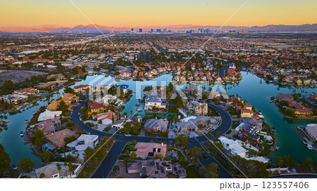 Aerial of Las Vegas Suburb at Sunset with Strip Skyline Aerial of Las Vegas Suburb at Sunset with Strip Skyline 123557406