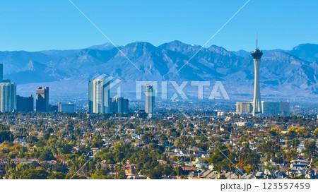 Aerial of Las Vegas Stratosphere Tower and Mountains in Daylight 123557459