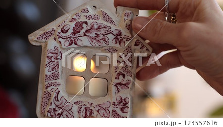 Handcrafted mosaic house DIY craft project for unique home shaped decor 123557616