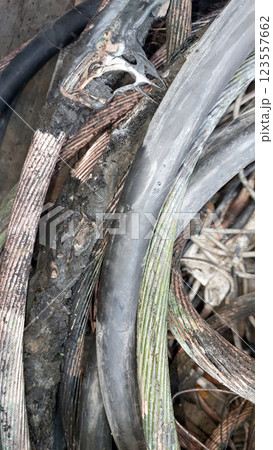 Heated Electrical Cables Intertwined With Wear Showing Signs of Use and Age in an Industrial Setting 123557662