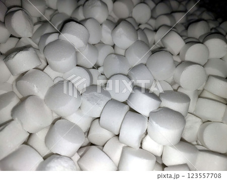 Tablet Salt Clusters Create a Visually Striking Display of Purity and Texture in Natural Light Tablet Salt Clusters Create a Visually Striking Display of Purity and Texture in Natural Light 123557708