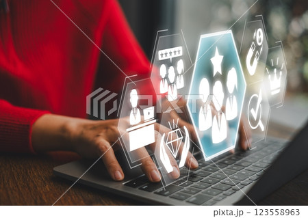 Visual representation of employer branding with digital icons and a professional using a laptop, symbolizing modern workplace strategies. 123558963