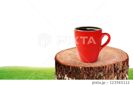 Red coffee mug on natural tree stump. Red coffee mug on natural tree stump. 123563112
