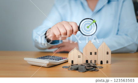 Target to saving money for retirement, Property cash flow, House with money, Symbolizing tax planning, Concept of finance or refinance real estate, Growth investment from property, Loan, Real. 123563503