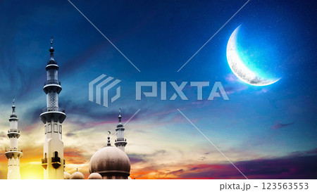 View of the mosque with a crescent moon in the night scene. Copy space or mockup. Concept of Eid Al Fitr and Ramadan Mubarak. Islamic background 123563553