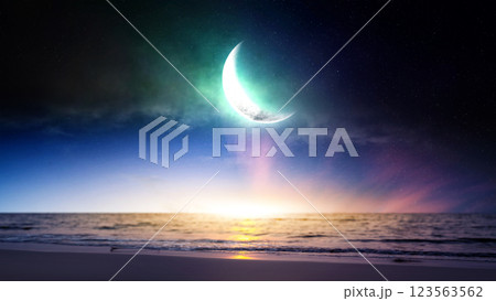 Islamic night sunset with a view of the ocean and the crescent moon. Hilal at night with some clouds in the sky. Copy space or mockup. Concept of Eid Al Fitr and Ramadan Mubarak. Islamic background Islamic night sunset with a view of the ocean and the crescent moon. Hilal at night with some clouds in the sky. Copy space or mockup. Concept of Eid Al Fitr and Ramadan Mubarak. Islamic background 123563562
