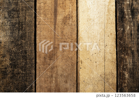 Top view of an arranged wood plank. Natural wooden texture or brown background or wallpaper. Flat lay. Copy space or mockup Top view of an arranged wood plank. Natural wooden texture or brown background or wallpaper. Flat lay. Copy space or mockup 123563658