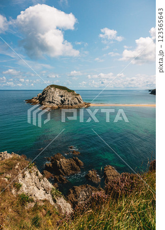 Scenic rocky island with a Scenic rocky island with a 123565643