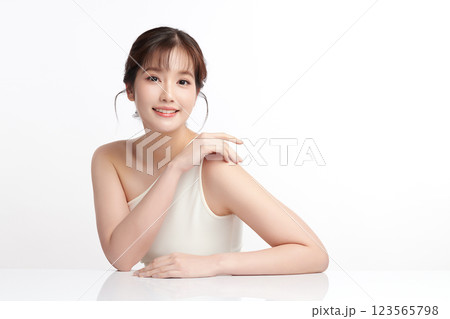 Beautiful young asian woman with clean fresh skin on white background, Face care, Facial treatment, Cosmetology, beauty and spa, Asian women portrait. Beautiful young asian woman with clean fresh skin on white background, Face care, Facial treatment, Cosmetology, beauty and spa, Asian women portrait. 123565798