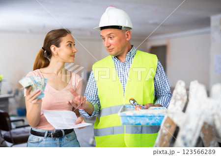Man house painter getting paid for work 123566289