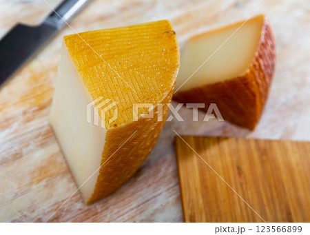 View of a pieces of semi-hard cheese 123566899