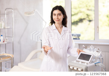 her professional demeanor and inviting smile 123567368