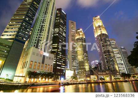 Night view of the Financial District skyscrapers along the Singapore River. Night view of the Financial District skyscrapers along the Singapore River. 123568336
