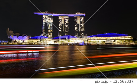 Night view of the Marina Bay Sands, is an integrated resort fronting Marina Bay in Singapore, including a hotel, exhibition centre, Shopping mall, museum, casino, etc. 123568337
