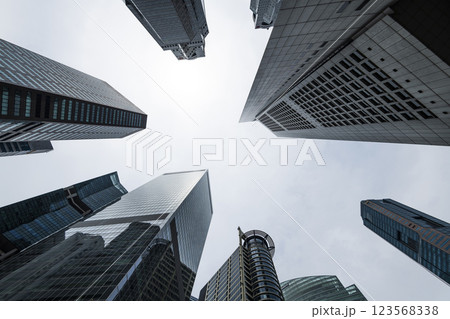 Low-angle building view of the modern office skyscrapers in the financial district of Raffles Place, Singapore. 123568338