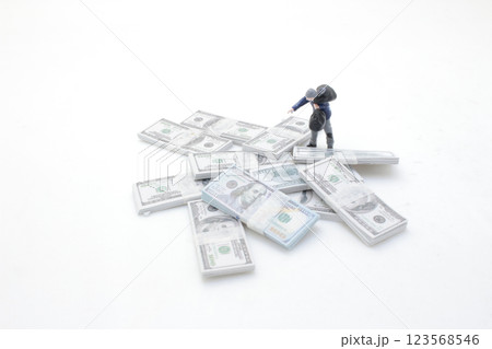 Man with Money Stacks Depicting Finance Concept Man with Money Stacks Depicting Finance Concept 123568546