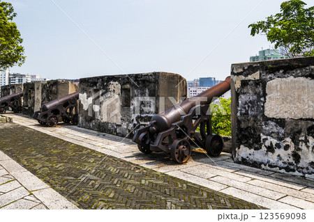 Replica cannon and defense wall of Mount Fortress, Fortaleza do Monte is located in Santo Antonio in Macau. The fort is one of the UNESCO World Heritage. 123569098