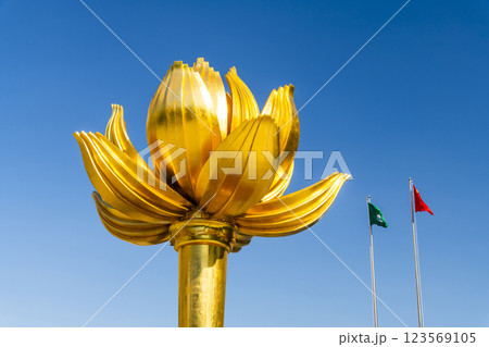 Close-up of Lotus Flower in Full Bloom Statue at Lotus Square in Macau, China with a sky background. Close-up of Lotus Flower in Full Bloom Statue at Lotus Square in Macau, China with a sky background. 123569105
