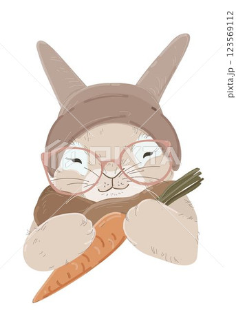 Cute rabbit wearing knitted hat holding carrot Cute rabbit wearing knitted hat holding carrot 123569112