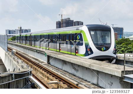 A Green Line train running on the elevated track of the Taichung Rapid Transit System in Taiwan.  123569327