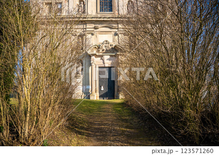 Old cathedral near Neo-Gothic style castle in Chyse, Czech republic 123571260