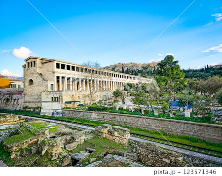 Ancient agora showcases stunning architecture and rich history in vibrant daylight in Athens, Greece Ancient agora showcases stunning architecture and rich history in vibrant daylight in Athens, Greece 123571346