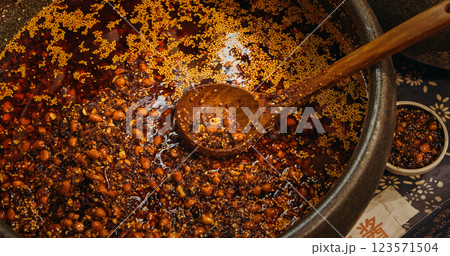 Chengdu, Sichuan, China. Ceramic Pots With Prepared Sichuan Sauce, close up view. Sichuan Cuisine Or Sichuanese Cuisine. Soy Sauce With Bold Flavours, Pungency And Species. Sauce With Garlic And Chili 123571504