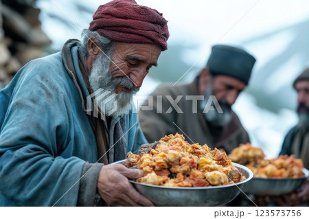 Group distributes food to vulnerable community in devastated area during overcast weather 123573756