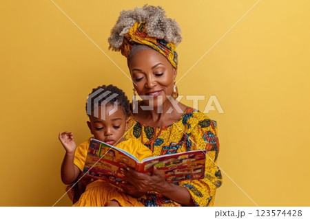 Middle aged woman teaching children reading skills in community center with warm tones 123574428