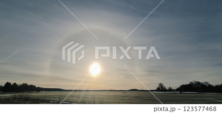 Amazing winter sun halo landscape 123577468