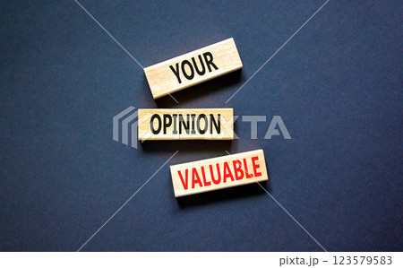 Your opinion valuable symbol. Concept words Your opinion valuable on beautiful wooden blocks. Beautiful black table black background. Business your opinion valuable concept. Copy space. 123579583