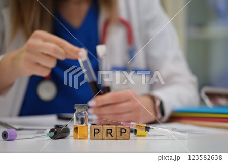 A medical professional is preparing PRP treatments and collecting necessary samples for procedures 123582638