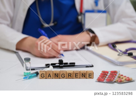A Medical Professional Conducting an Examination of Gangrene using Necessary Medication and Tools A Medical Professional Conducting an Examination of Gangrene using Necessary Medication and Tools 123583298