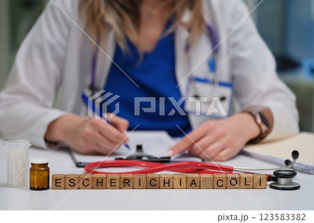 Healthcare Professional Conducting a Thorough Analysis of an Escherichia Coli Sample Healthcare Professional Conducting a Thorough Analysis of an Escherichia Coli Sample 123583382